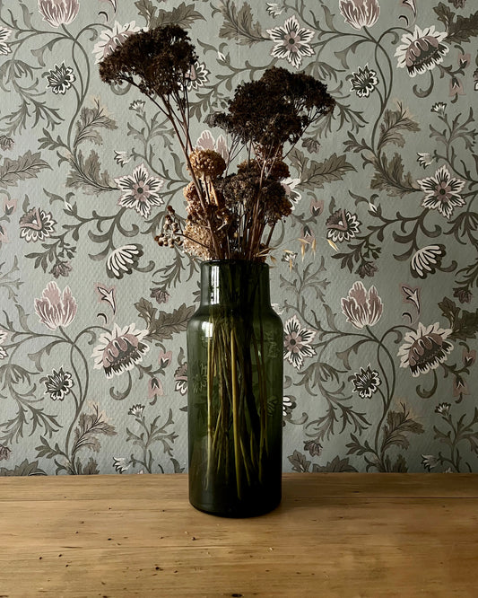 Vase en verre vert bouteille