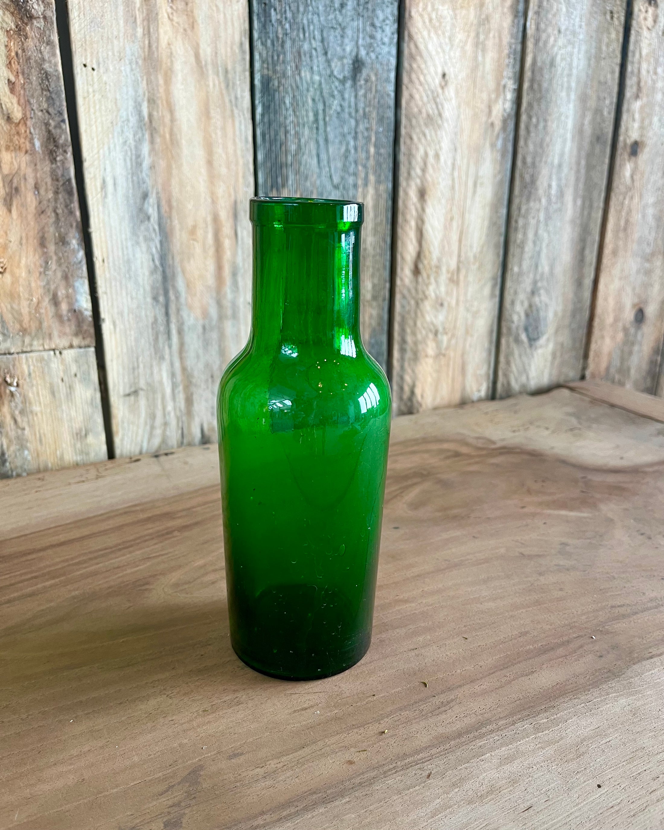 Vase en verre vert